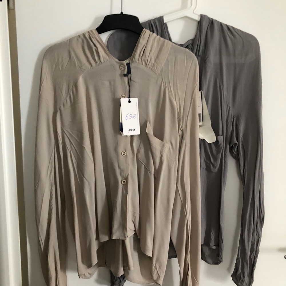 Brand new With tag silky blouse in beige color